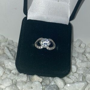single diamond with side diamond settings